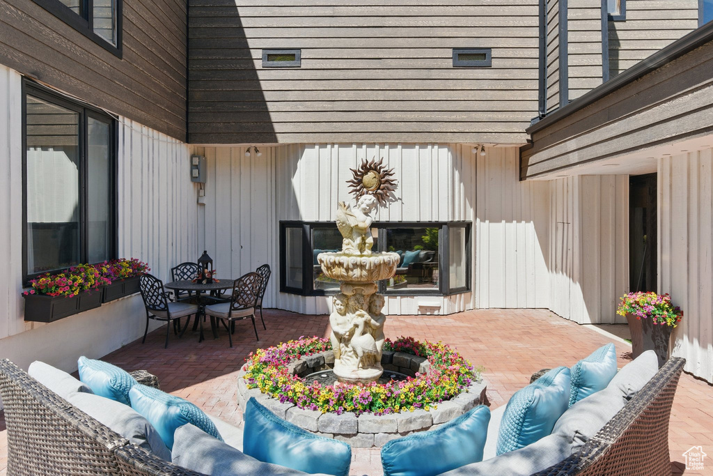 View of patio with outdoor lounge area