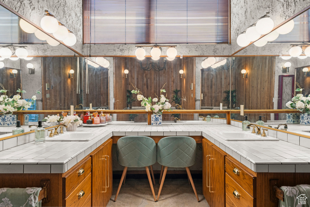 Bathroom featuring double vanity
