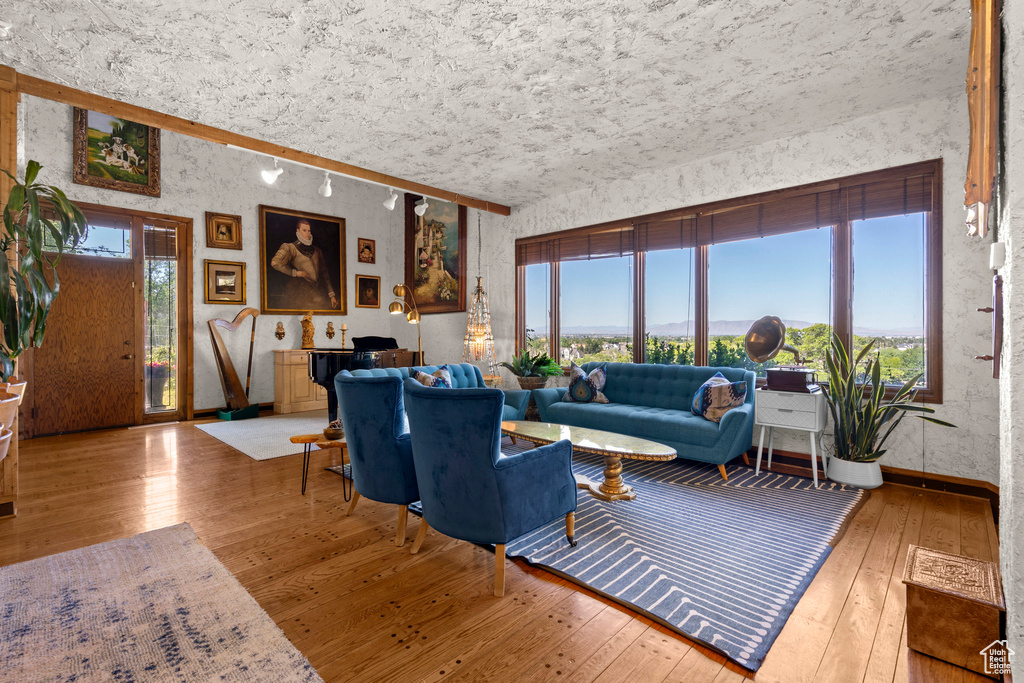 Living area featuring hardwood / wood-style floors