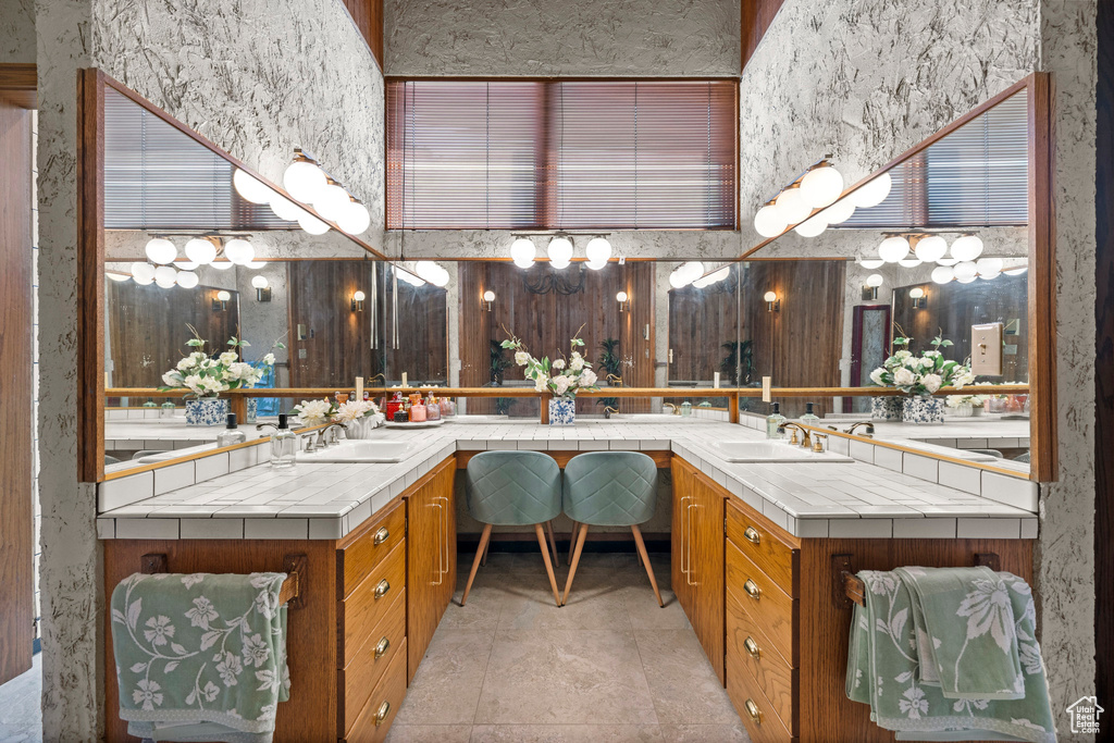 Bathroom featuring double vanity