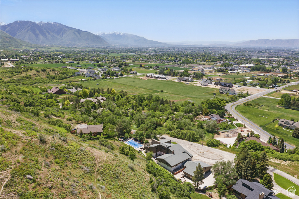 Aerial view of residential area with a mountainous background