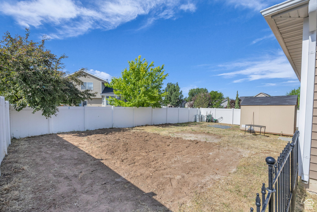 View of fenced backyard