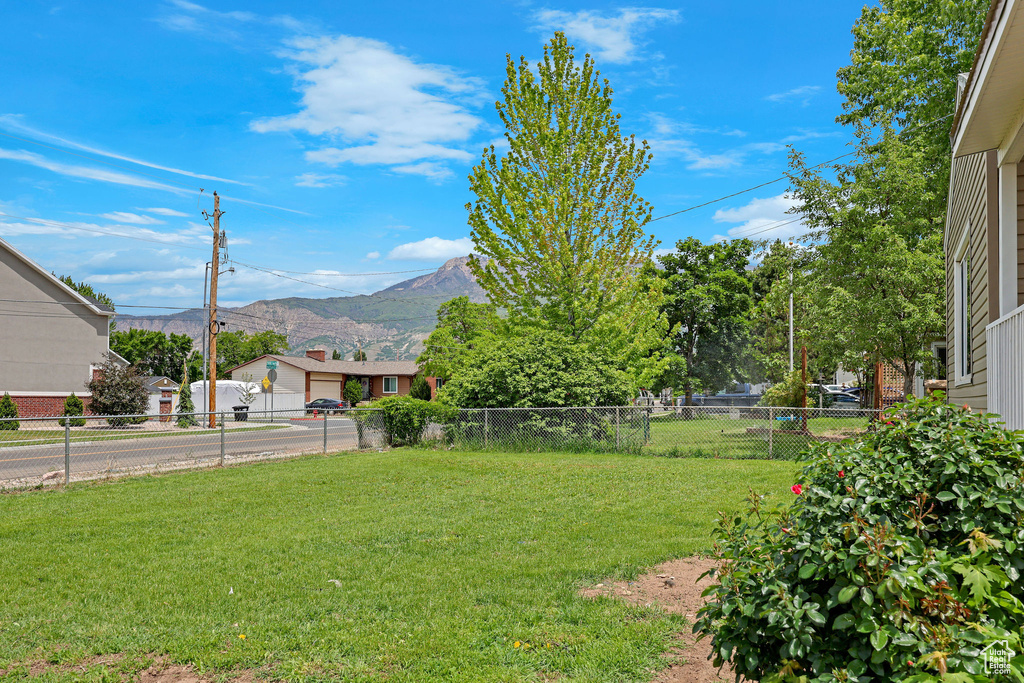 View of yard with a mountain view