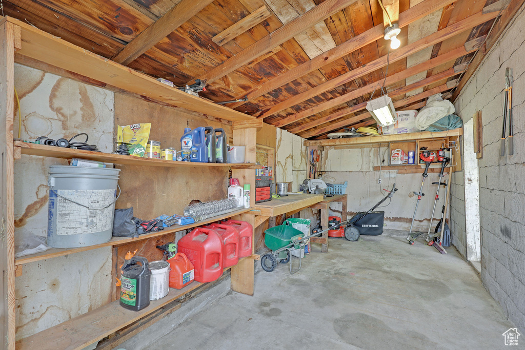 Garage featuring a workshop area