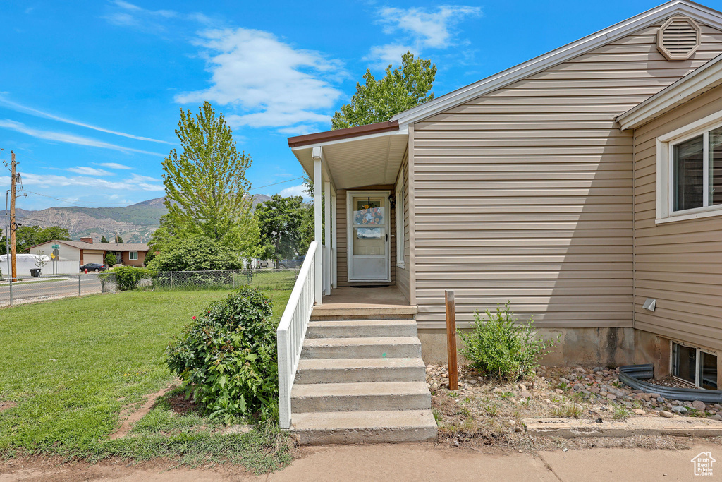 Doorway to property featuring a mountain view