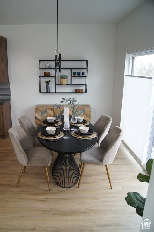 Dining space featuring light wood-style floors
