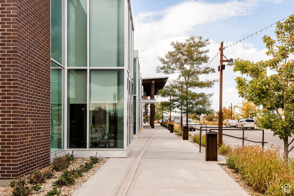 Exterior space featuring brick siding