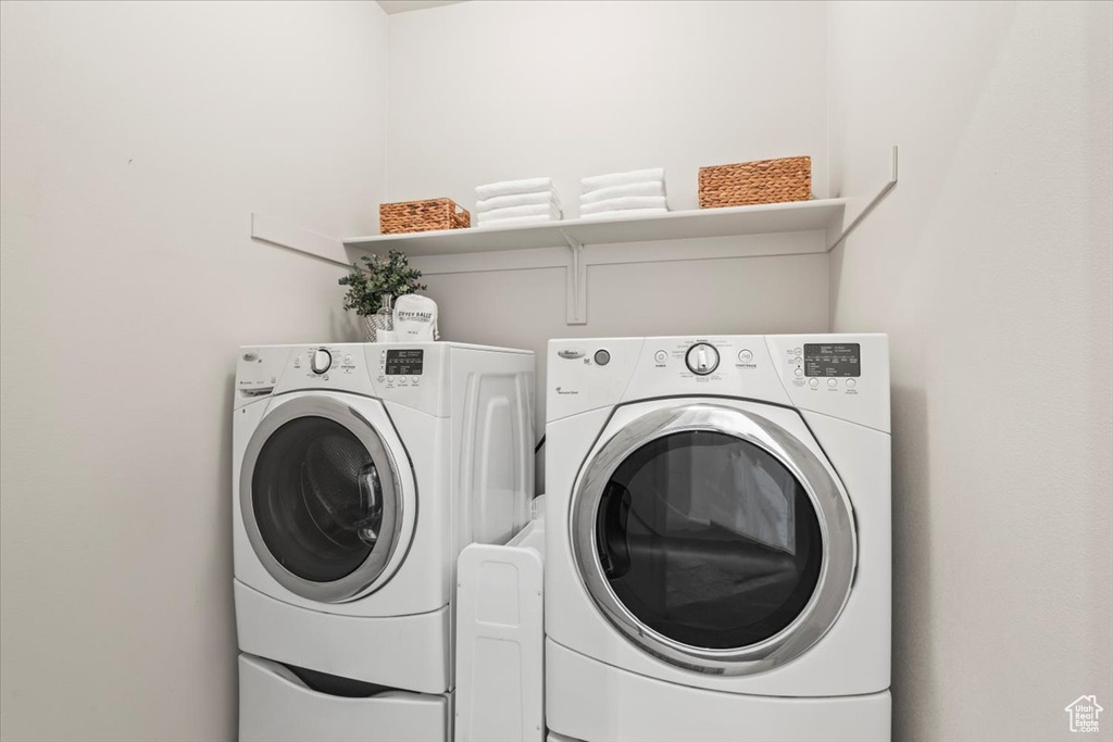 Laundry area featuring independent washer and dryer