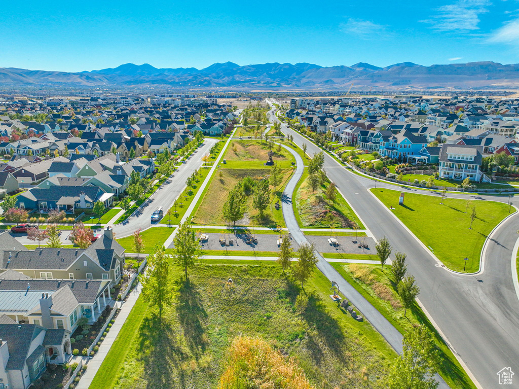 Aerial perspective of suburban area with a mountain backdrop
