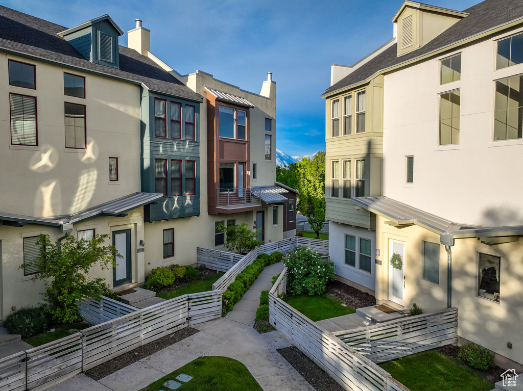 View of property with a residential view