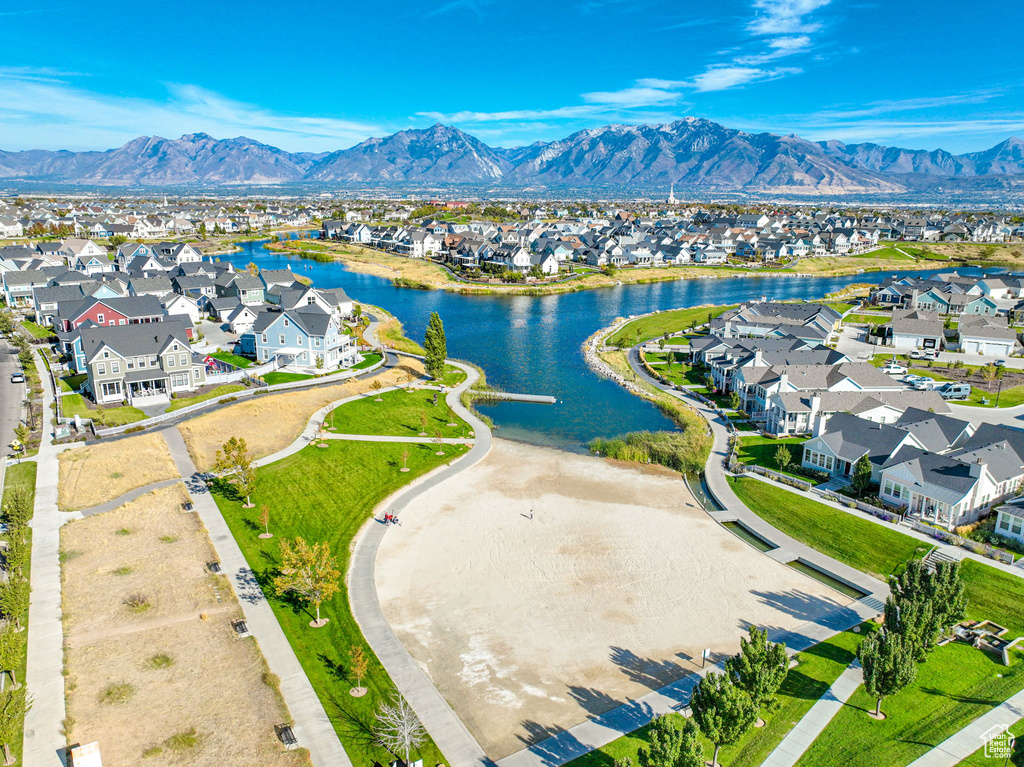 Aerial view of residential area featuring a water and mountain view