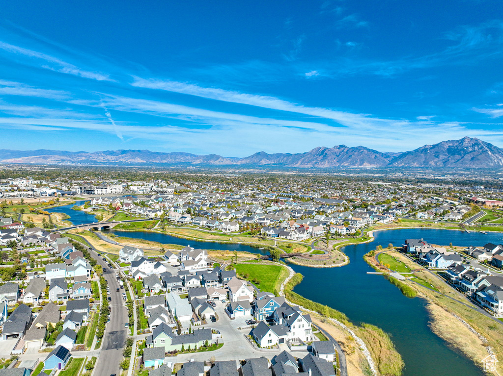Aerial view of residential area with a water and mountain view