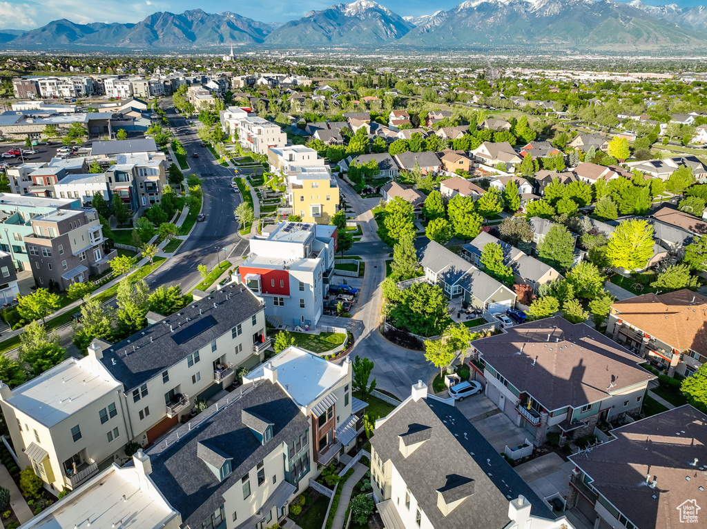 Aerial view of residential area with a mountain backdrop
