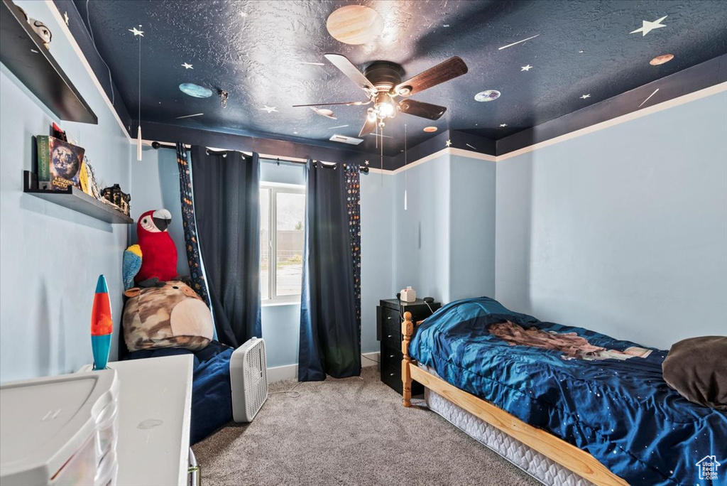 Bedroom with carpet flooring