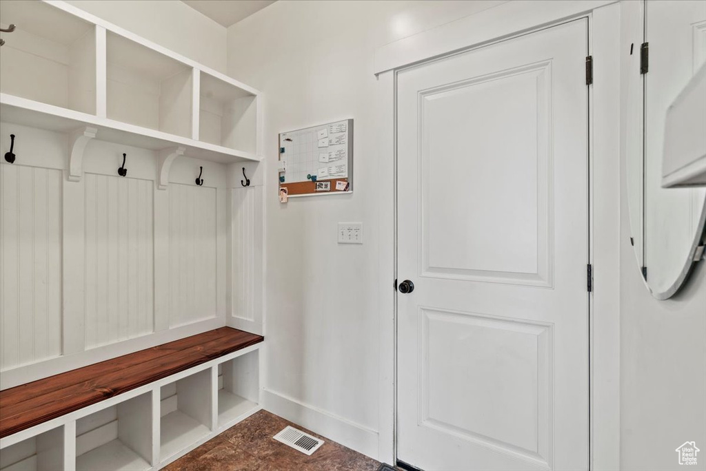 Mudroom featuring baseboards