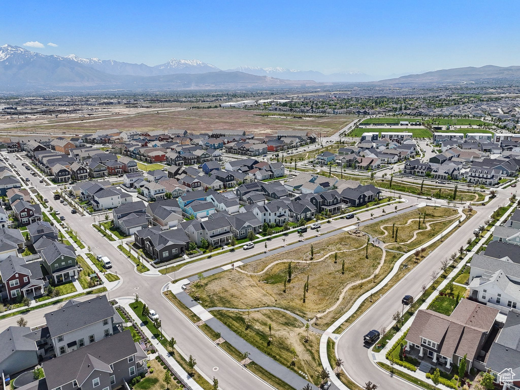 View of property location with nearby suburban area and a mountainous background