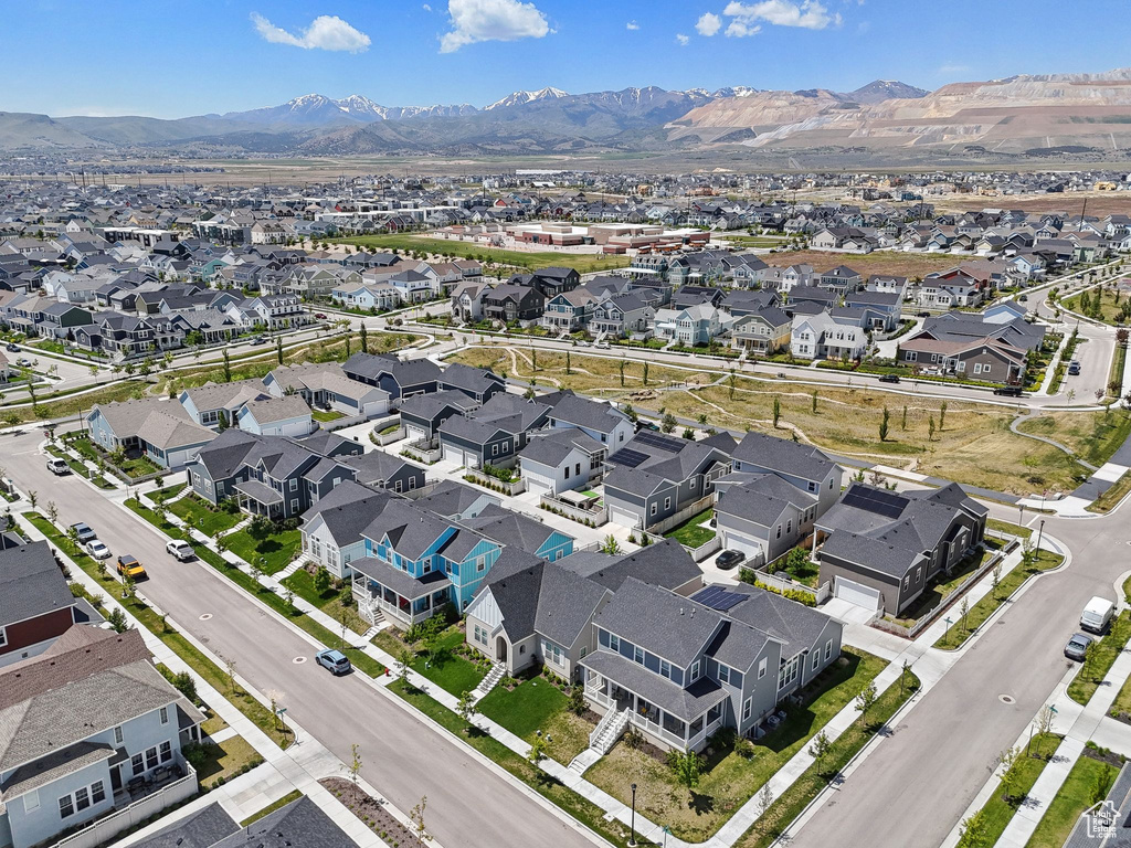 Aerial view of property\\\\\\\'s location with nearby suburban area and a mountainous background