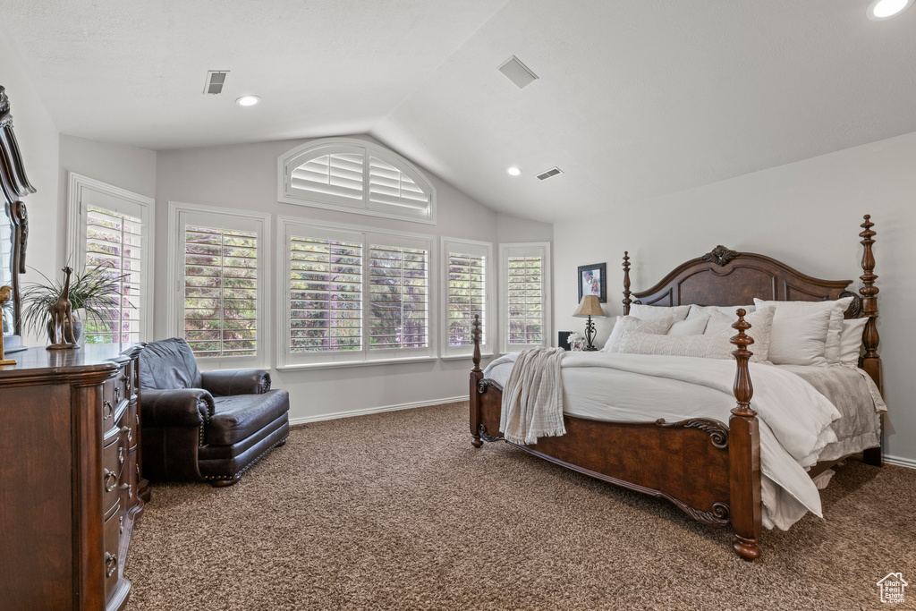Bedroom with carpet, lofted ceiling, baseboards, and recessed lighting