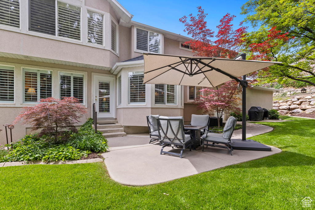 View of patio / terrace with entry steps and area for grilling