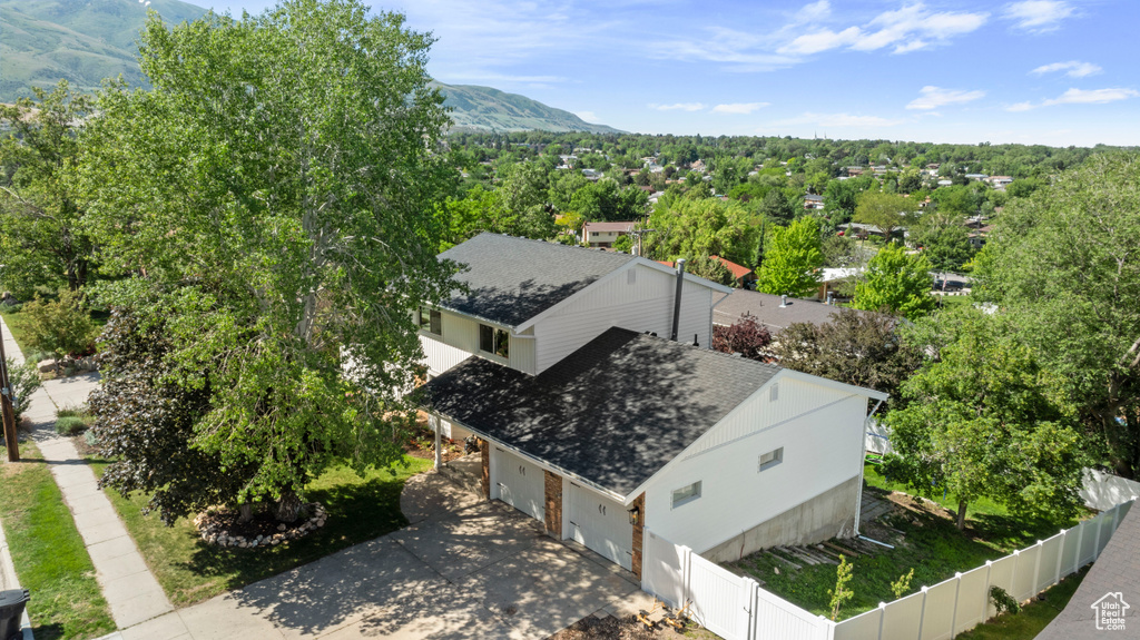 View of subject property with a mountain backdrop