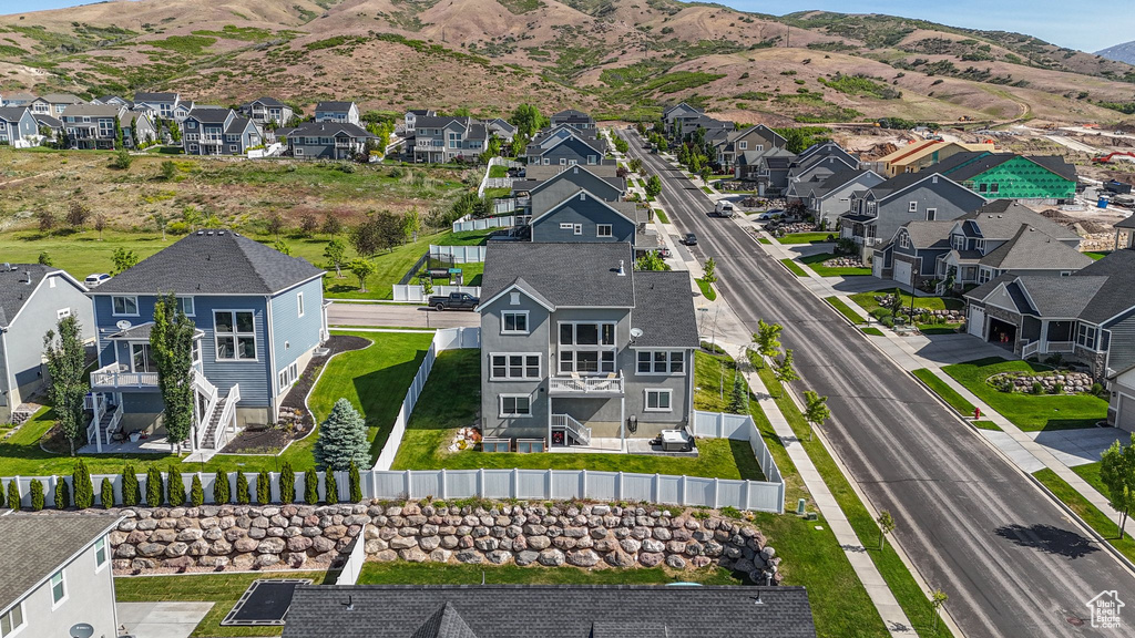 Aerial view of residential area with a mountainous background