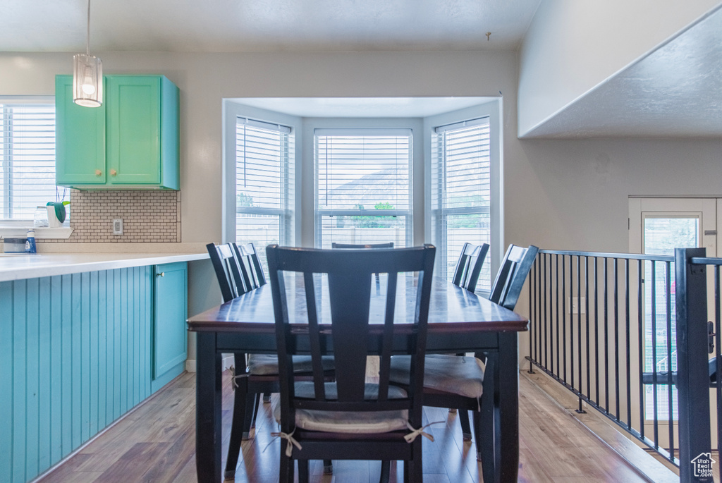 Dining area featuring light wood finished floors