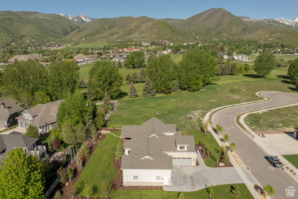 Aerial perspective of suburban area with mountains