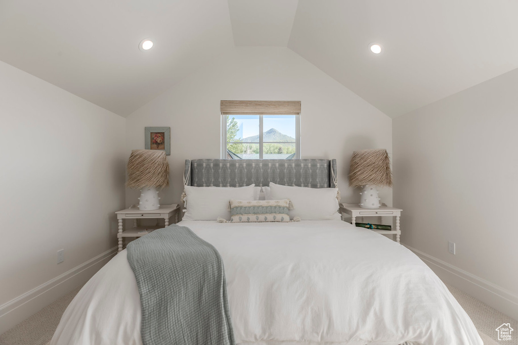 Bedroom with baseboards, vaulted ceiling, carpet flooring, and recessed lighting