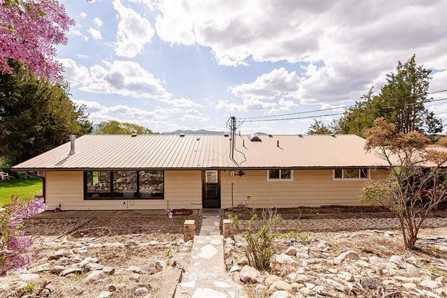 View of front facade with metal roof