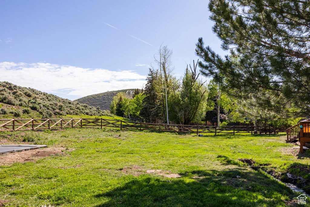 View of yard with a mountain view
