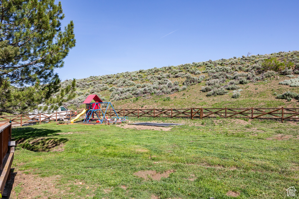 View of yard with a playground
