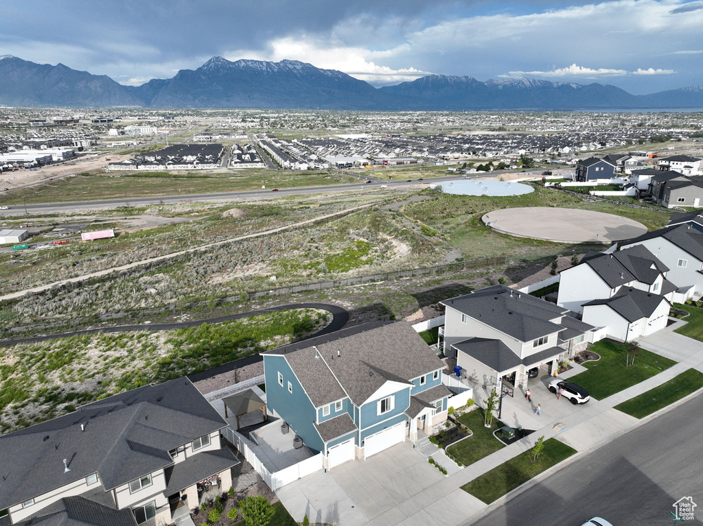 Aerial view of residential area with a mountain backdrop