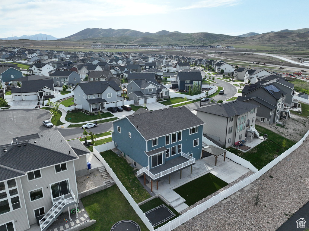 Aerial view of residential area with mountains