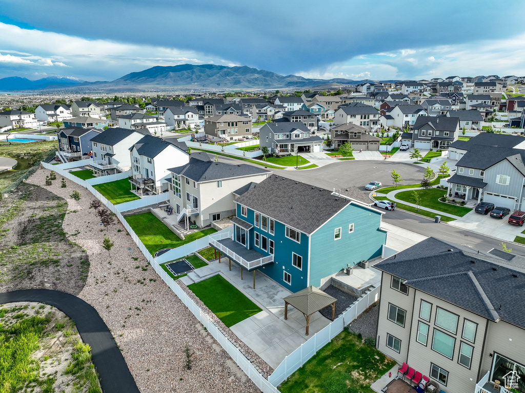 Aerial perspective of suburban area featuring mountains