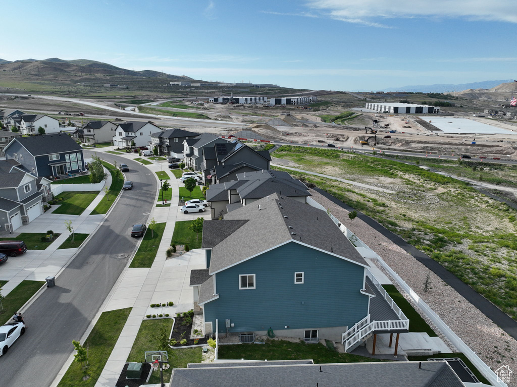Aerial view of residential area with a mountainous background