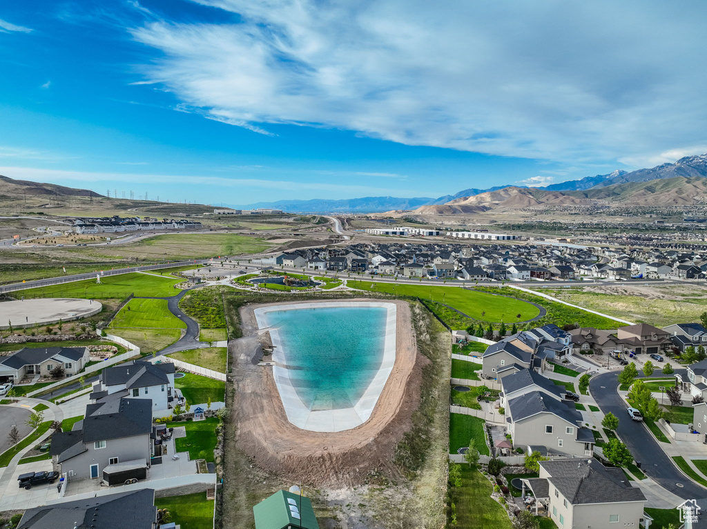 Aerial view of residential area with mountains