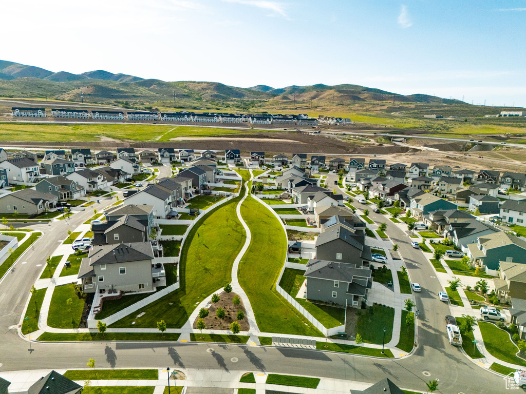 View of property location featuring nearby suburban area and mountains