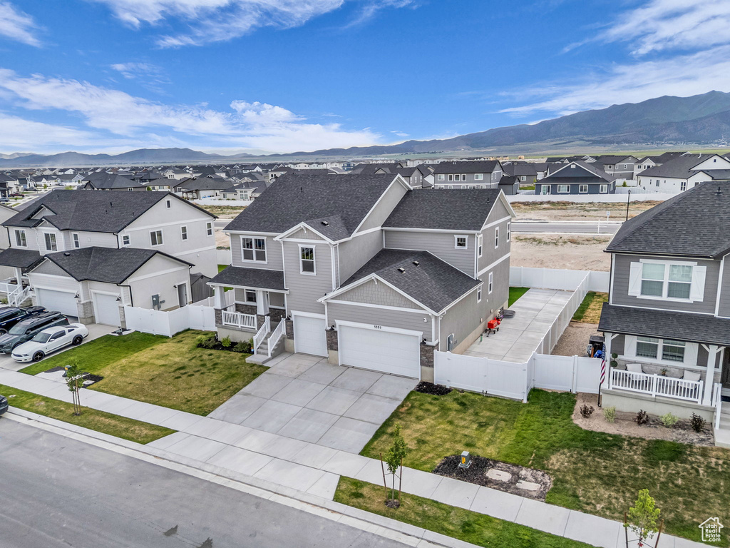 Aerial perspective of suburban area with mountains
