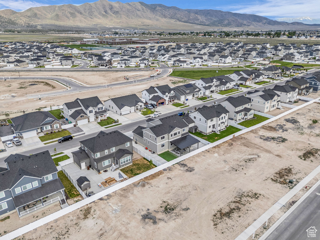 Aerial perspective of suburban area featuring mountains