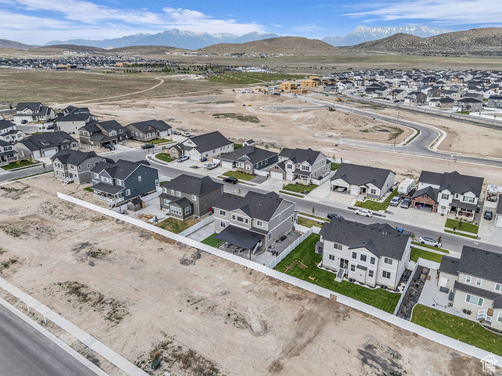 Aerial perspective of suburban area featuring mountains
