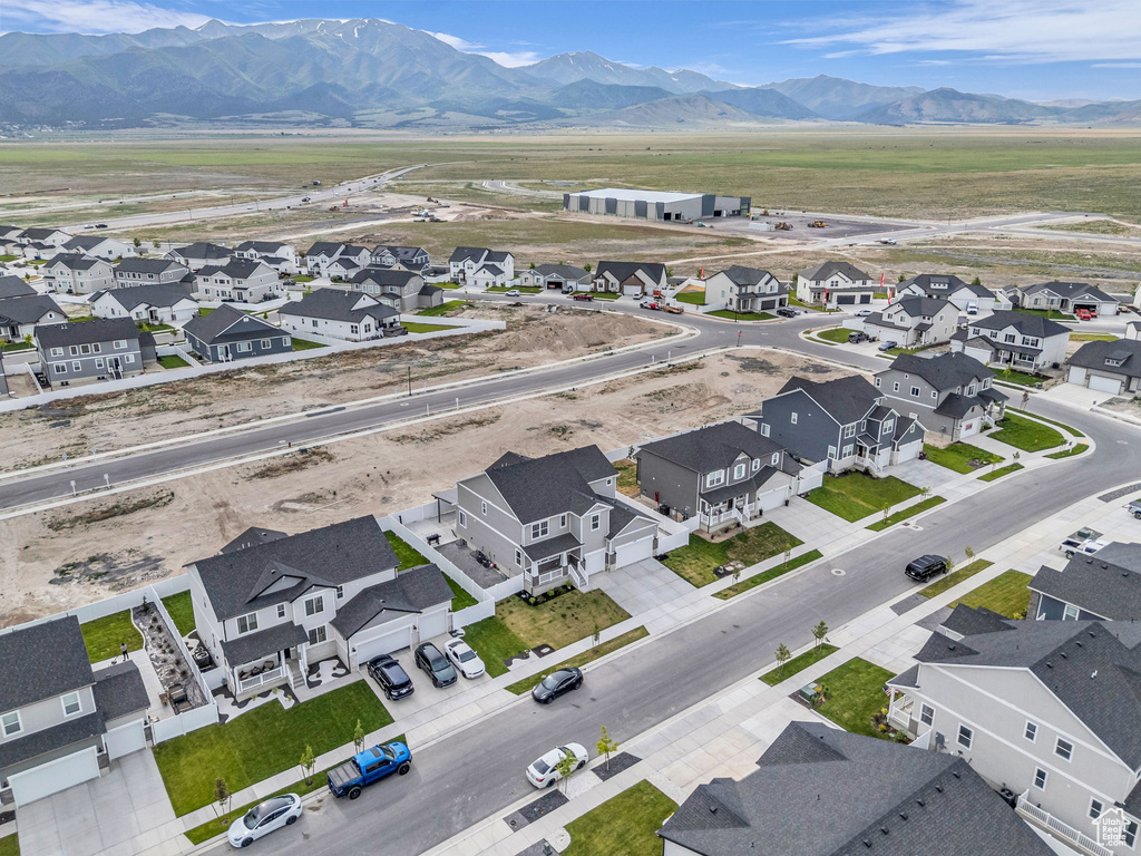 Aerial view of residential area with a mountain backdrop