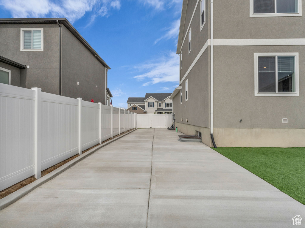 View of patio / terrace featuring concrete driveway