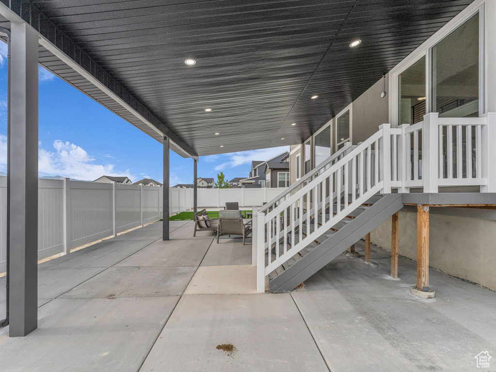 Fenced backyard featuring a patio area and outdoor dining space