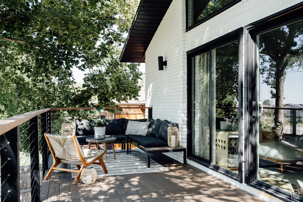 Balcony featuring outdoor lounge area