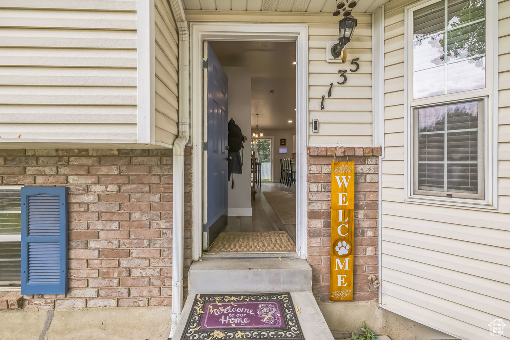 Property entrance with brick siding