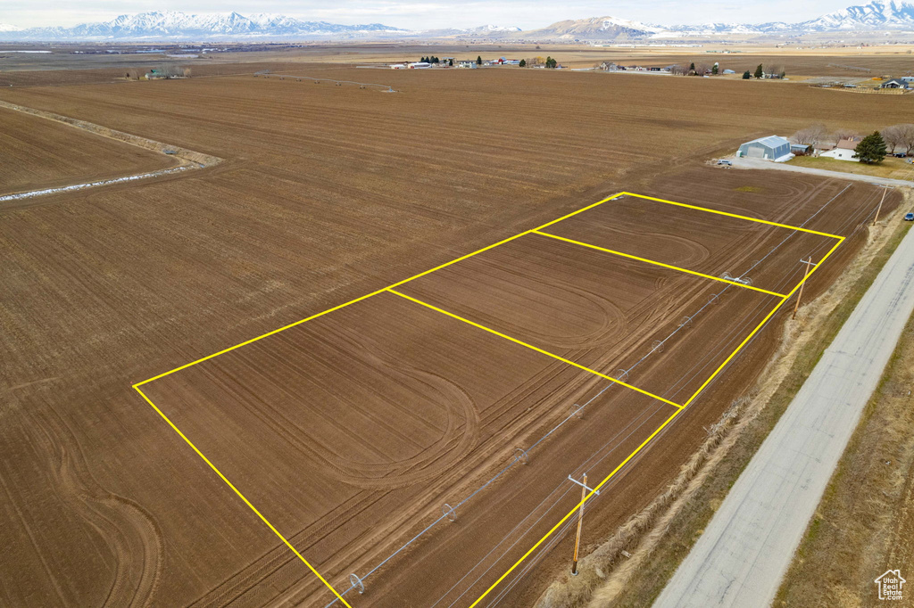 View of rural area with property parcel outlined and mountains
