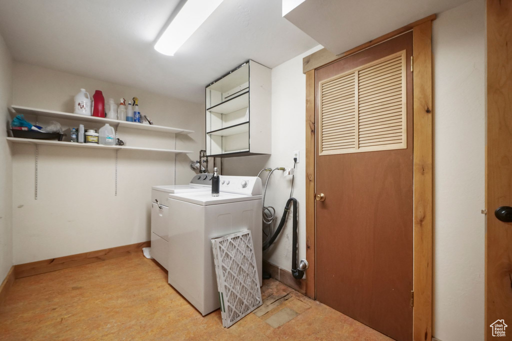 Laundry area featuring washer and clothes dryer