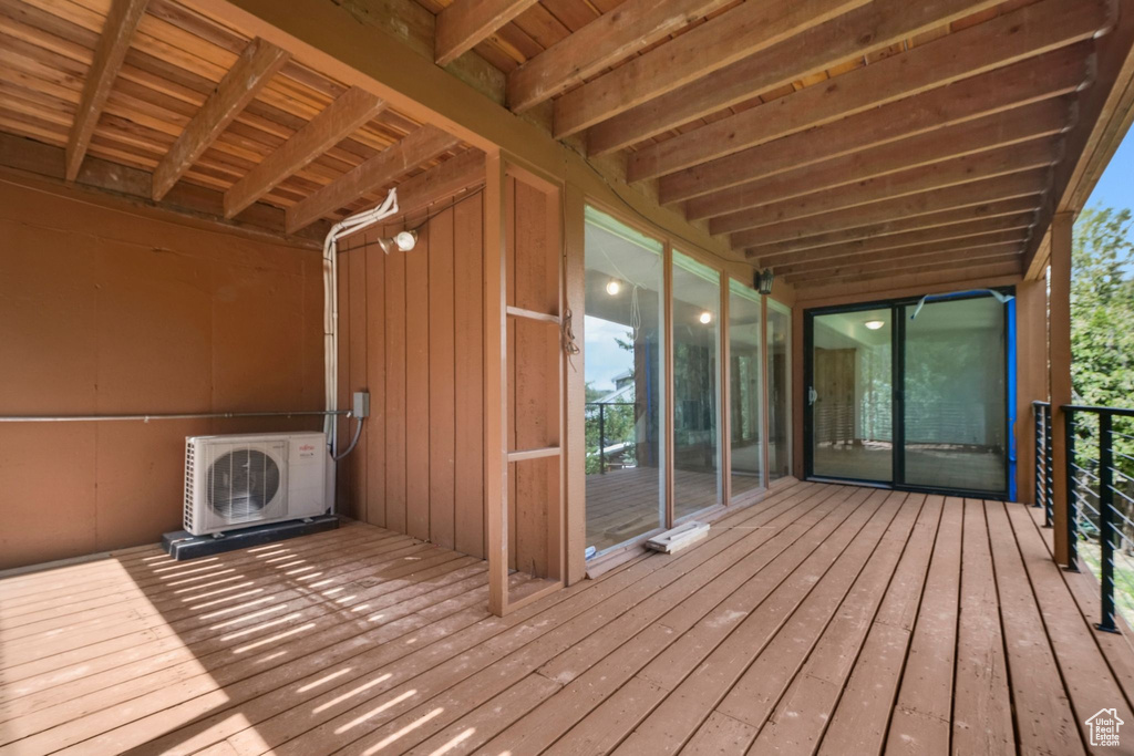 Deck featuring a cooling unit
