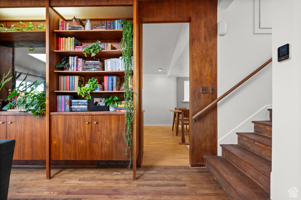 Interior space with wood finished floors and stairway