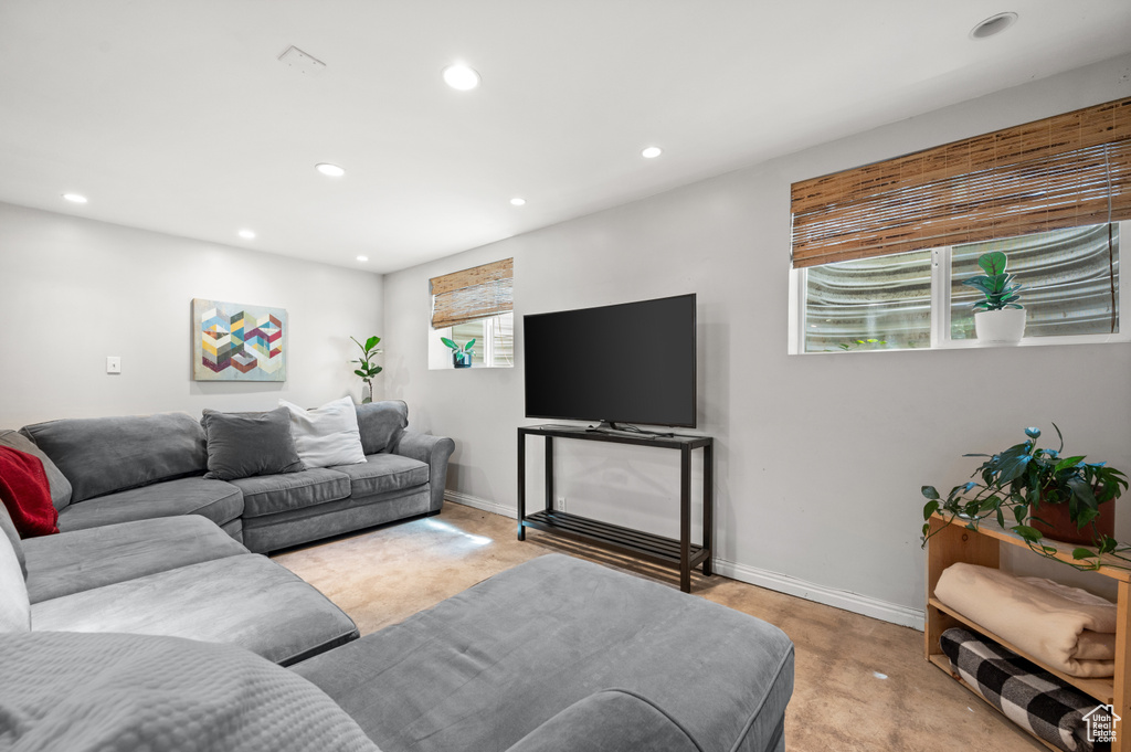 Living room featuring recessed lighting and baseboards